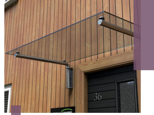 Стеклянные козырьки на входы и фасады в Ноябрьске